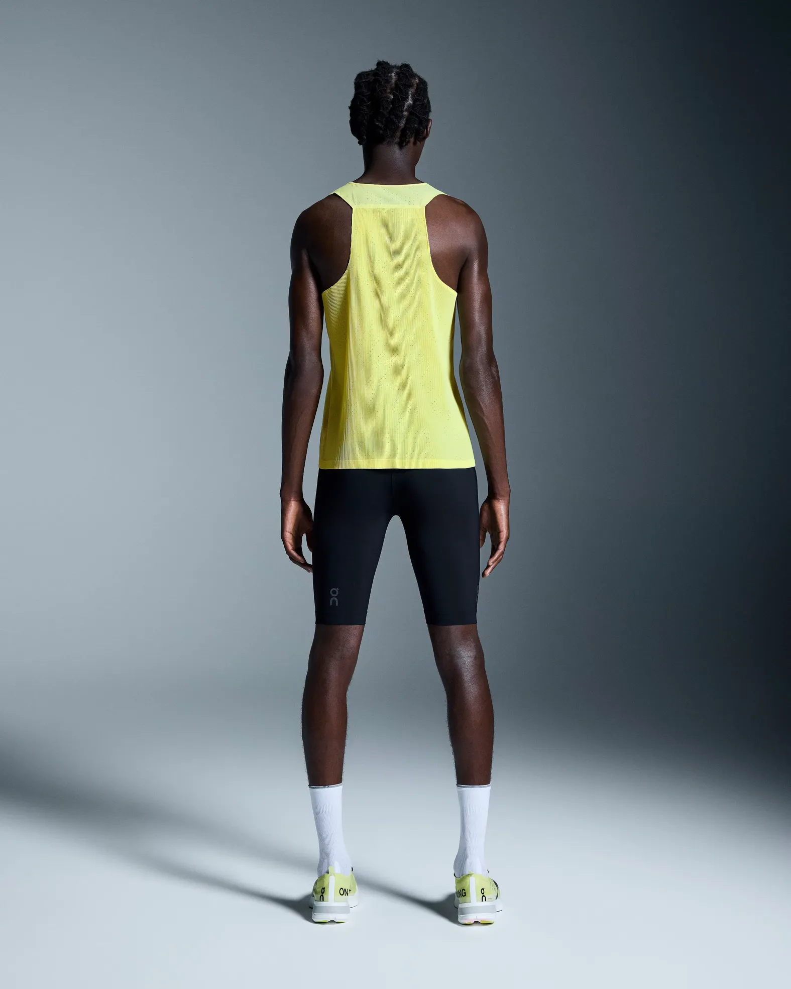 On M RACE SINGLET LIMELIGHT